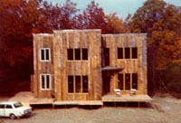 [spaceship house on a gravel pad]